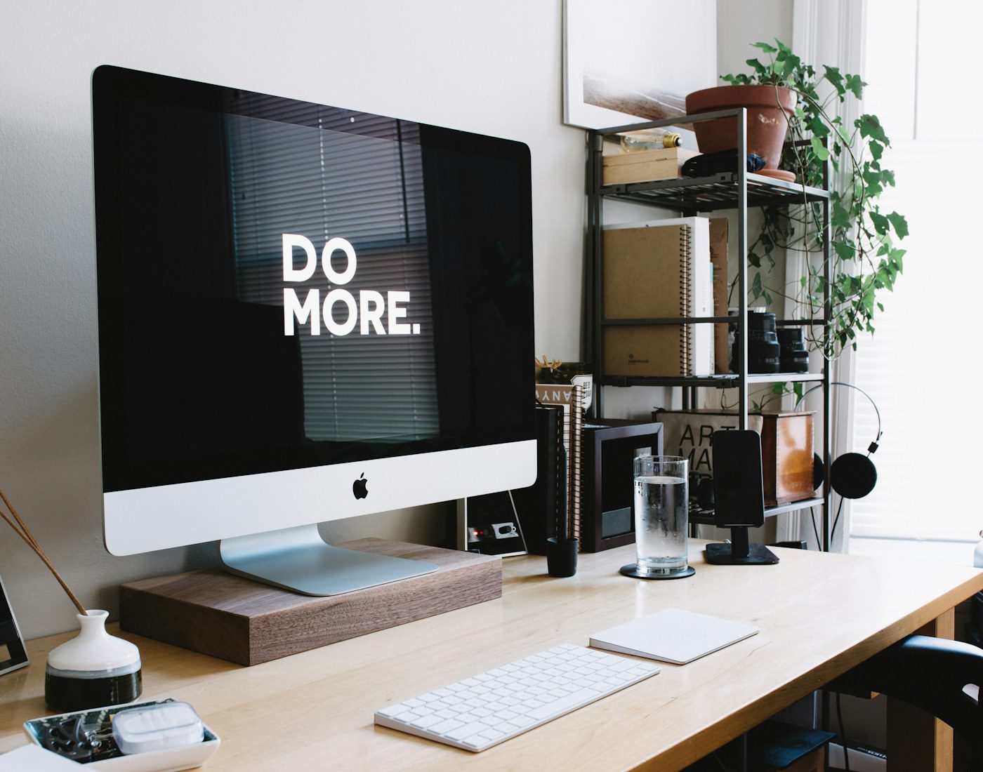 Desktop computer and stationery in a home workspace